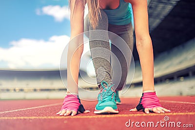 Athletic woman going for a jog or run at running track. Healthy fitness concept with active lifestyle. instagram filter Stock Photo