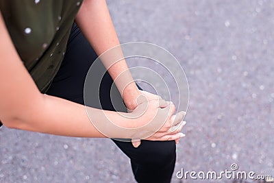 Athletic woman warming up before workout,Runner training outdoors Stock Photo