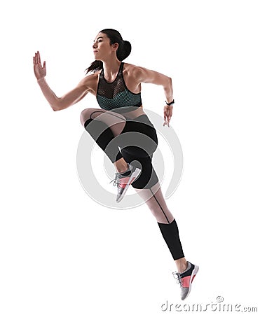 Athletic young woman running on white, side view Stock Photo