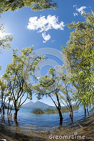 Atitlan and Toliman Volcanoes as seen from Santa Catarina Palopo in Lake Atitlan, Solola, Guatemala Stock Photo