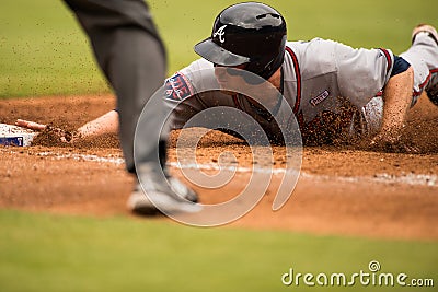 Atlanta braves runner sliding into first base Editorial Stock Photo