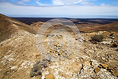 atlantic ocean rock stone hill and summer lanzarote spain Stock Photo