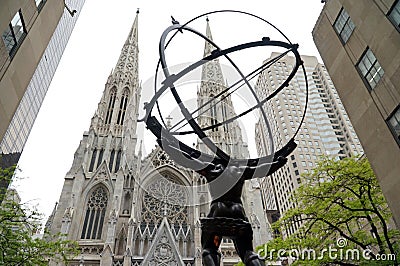 Atlas statue and St. Patrick's Cathedral in New York City. Editorial Stock Photo