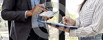 The atmosphere in the meeting room where businessmen and business partners are meeting together, meeting summaries and Stock Photo