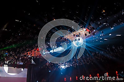 The atmosphere of the nightclub, the interior, the ceiling with a disco, a shiny glare, a ball and light bulbs nightlife Stock Photo