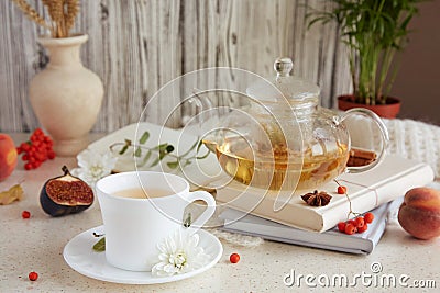 Atmospheric brunch of tea time, herbal tea and figs, peaches. Sweet desserts, natural herbal tea - natural sustainable Stock Photo