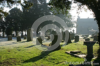 Atmospheric Cemetery Scene In Contre Jour Stock Photo