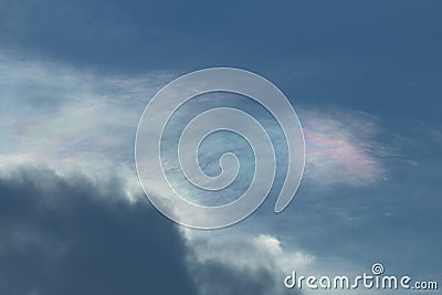Atmospheric phenomenon called iridiscent clouds Stock Photo