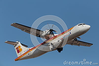 ATR 72 twin engine turboprop airliner taking off from palma airport Editorial Stock Photo