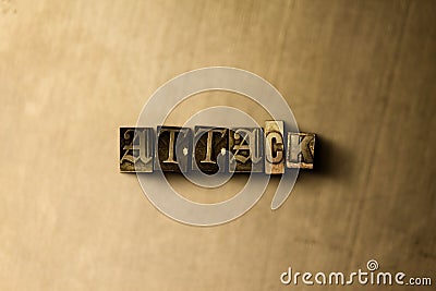 ATTACK - close-up of grungy vintage typeset word on metal backdrop Stock Photo