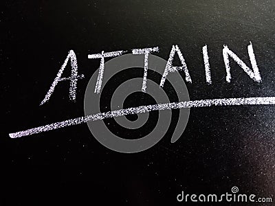 attain words displaying on chalkboard concept Stock Photo