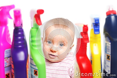 Attention: Baby wants to play with cleaner Stock Photo