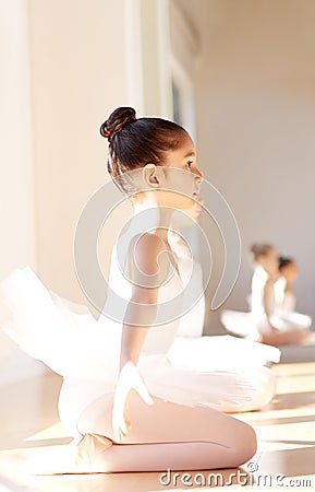 Attentive Ballerina Girl at the Ballet Training Stock Photo