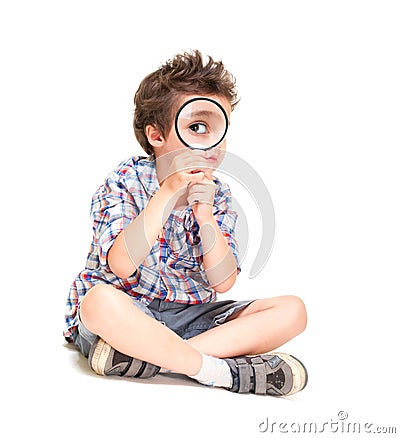 Attentive little boy with weird Stock Photo