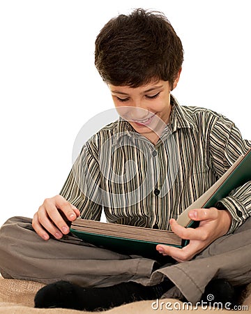 Attentive reading boy Stock Photo