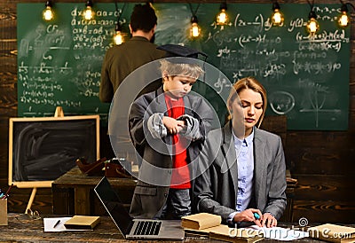 Attentive teacher talking to her student in science class at the university, Good teachers seek engaged students Stock Photo