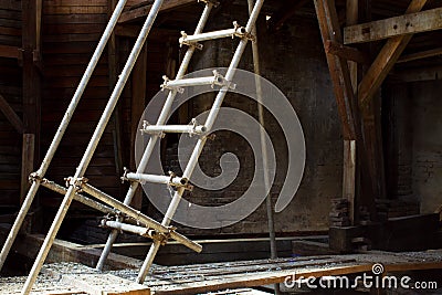 Attic with ladder Stock Photo