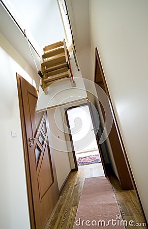 Attic ladder in modern house Stock Photo