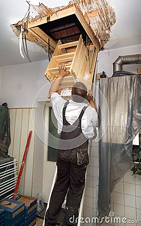 Attic ladder mounting Stock Photo