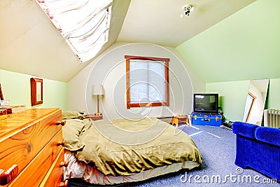Attic large bright simple bedroom Stock Photo