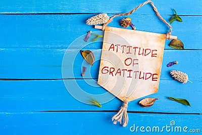 Attitude of gratitude text on Paper Scroll Stock Photo