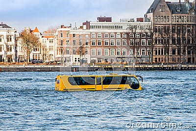 Attraction in Rotterdam, an amphibious vehicle in the river `de Maas` Stock Photo