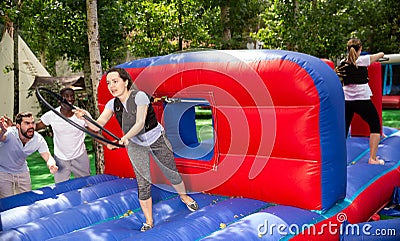 Attraction who is stronger and faster will put a hoop on a stick. Stock Photo