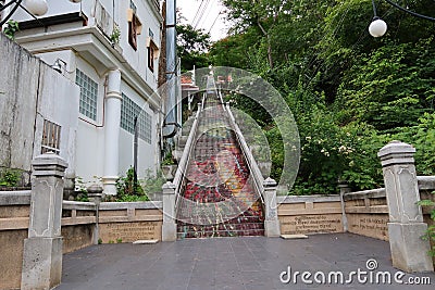 Attractions on the stairs up and down Wat Khao Kob or Wat Woranat Banphot, Nakhon Sawan Province, Thailand Stock Photo