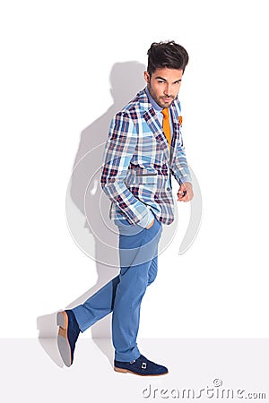 Attractive adult walking in studio Stock Photo