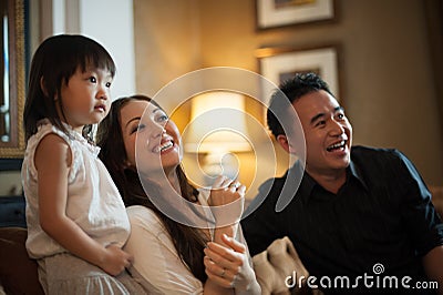 Attractive Asian Family Laughing Stock Photo