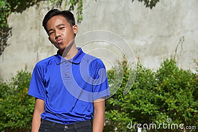 A Kissing Youthful Filipino Boy Stock Photo