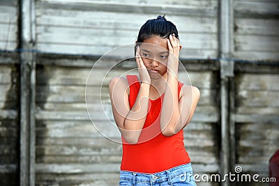 A Stressful Minority Female Youngster Stock Photo