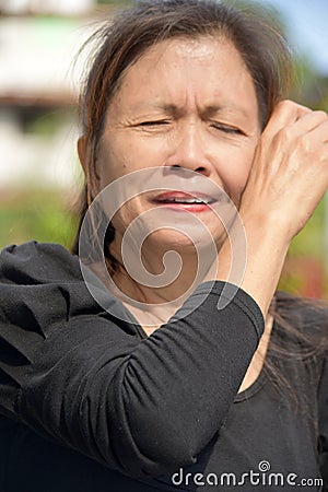 A Tearful Female Senior Stock Photo