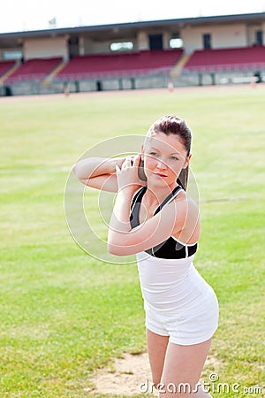 Attractive athletic woman holding a weight Stock Photo