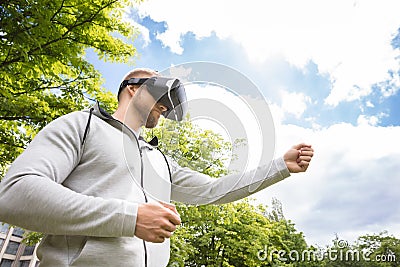 Man Enjoying Virtual Reality Glasses Stock Photo