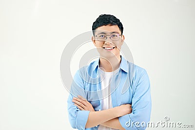 Attractive beautiful smiling positive nerd man. Close up portrait asian man wearing glasses isolated on white background Stock Photo