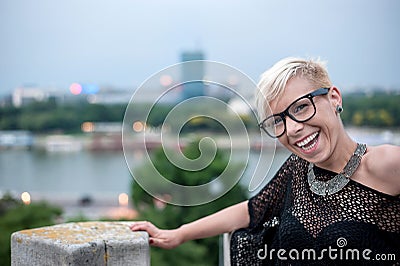 Attractive blonde on the fortress wall Stock Photo