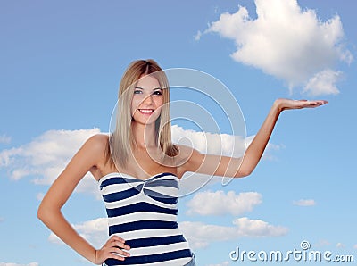 Attractive blonde girl with her hand extended Stock Photo