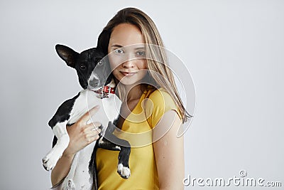 Attractive brown-haired girl adores pets Stock Photo