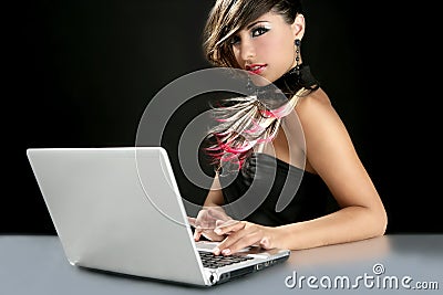 Attractive brunette fashion woman with laptop Stock Photo