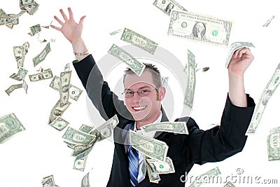 Attractive Business Man In Suit Throwing Money Into Air Stock Photo