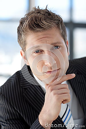 Attractive Businessman looking at camera Stock Photo