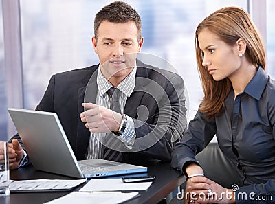 Attractive businesspeople having discussion Stock Photo