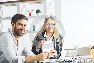 Attractive businesspeople working on project Stock Photo