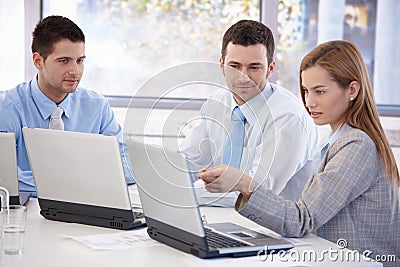 Attractive businesspeople working together smiling Stock Photo