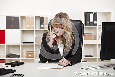 Attractive businesswoman chatting on the phone Stock Photo