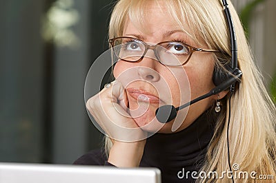 Attractive Businesswoman with Phone Headset Stock Photo