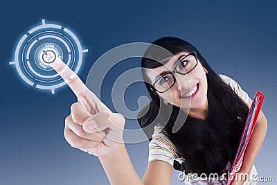 Attractive college student touching virtual screen Stock Photo