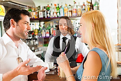 Attractive couple in cafe or coffeeshop Stock Photo