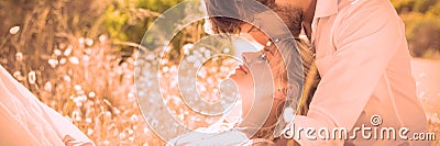 Attractive couple relaxing in the countryside Stock Photo